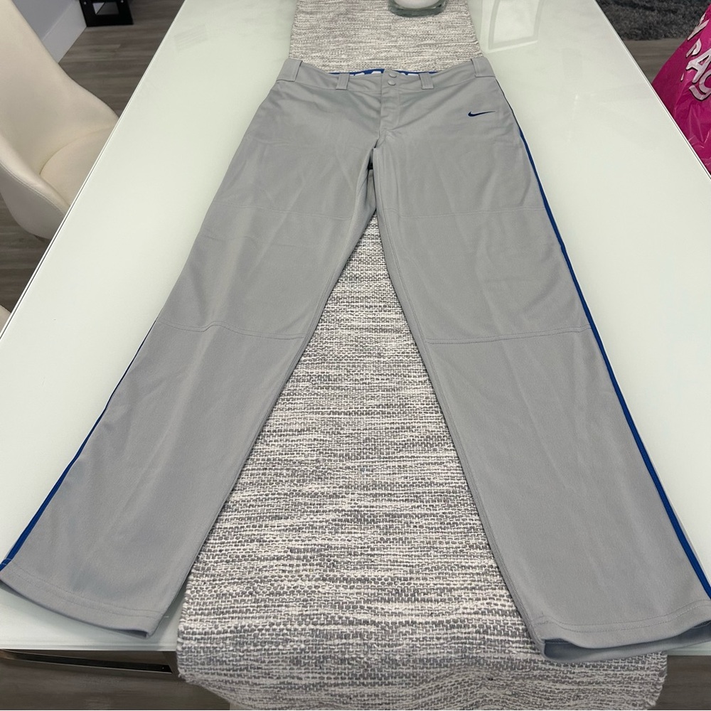 New, never used. Nike Men's Swoosh Piped Dri-FIT Baseball Pants.